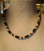 Collier h&eacute;matite