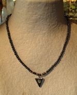 Collier h&eacute;matite